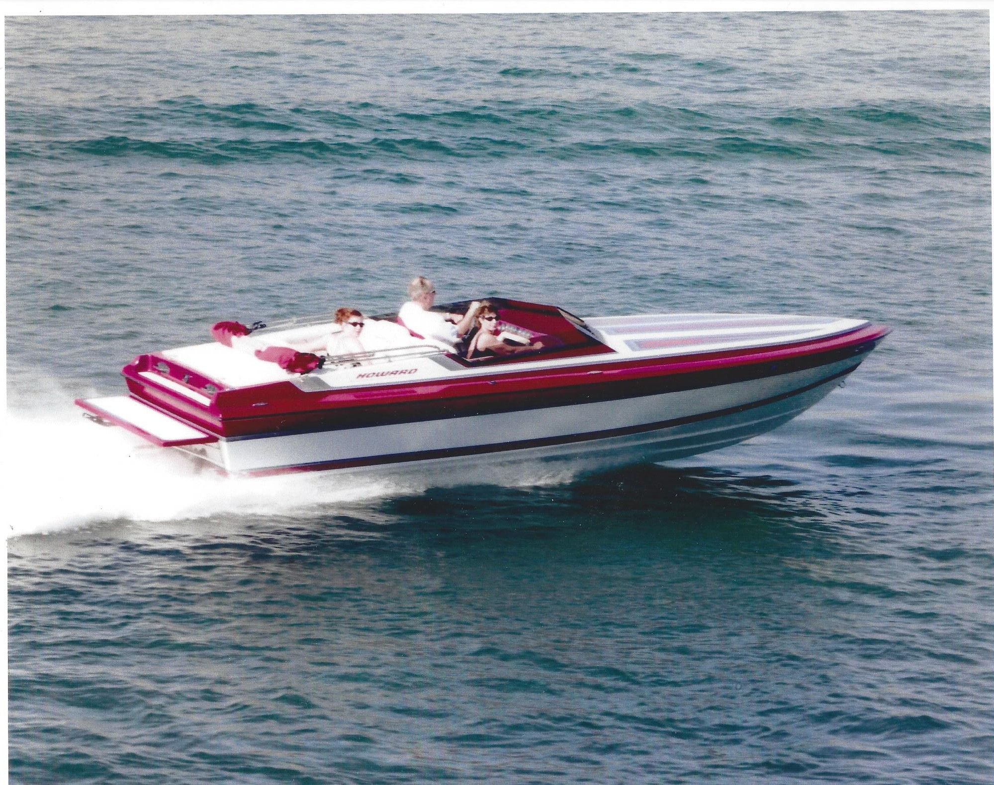 Classic performance boat running hard